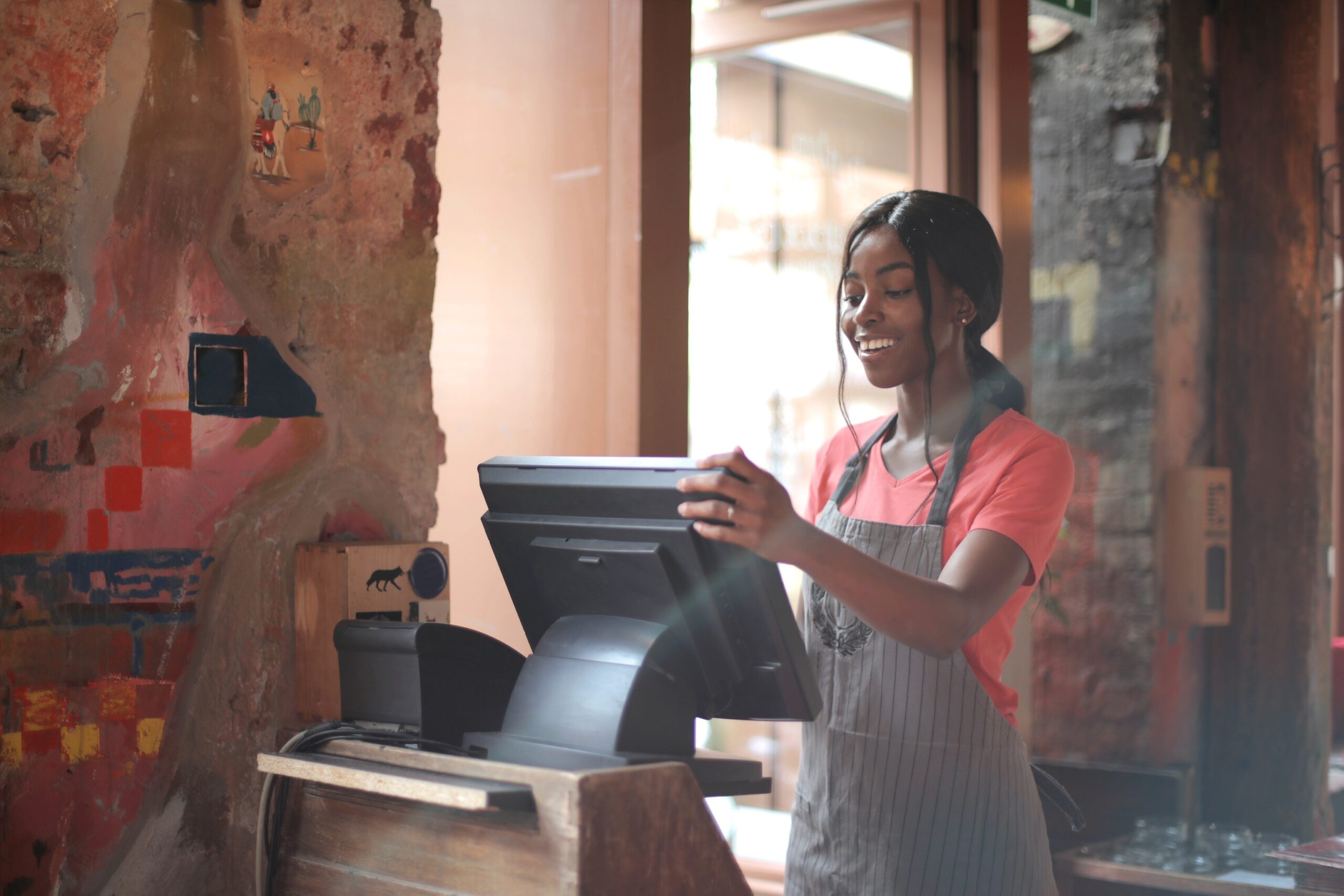 young woman working at a bar